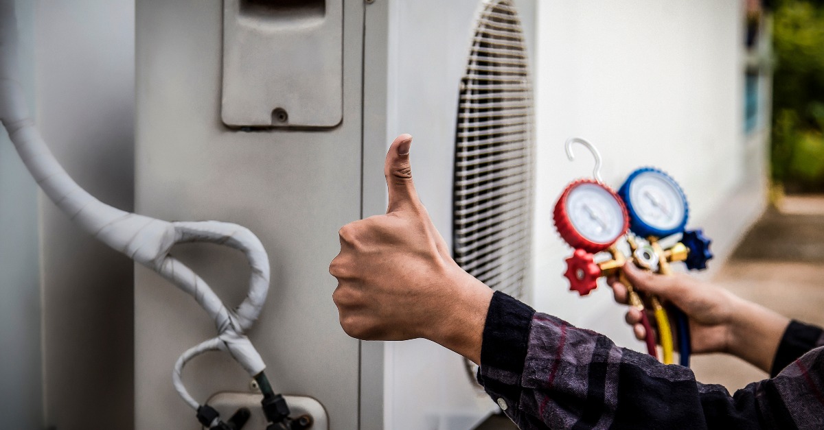 hvac-professional-checking-ac-for-winston-salem-air-conditioning-repair